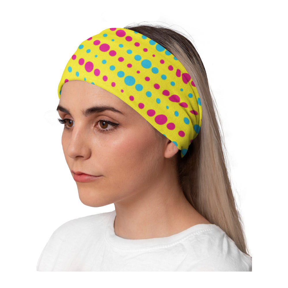 Girl wearing Lunabands yellow dots multi use headband